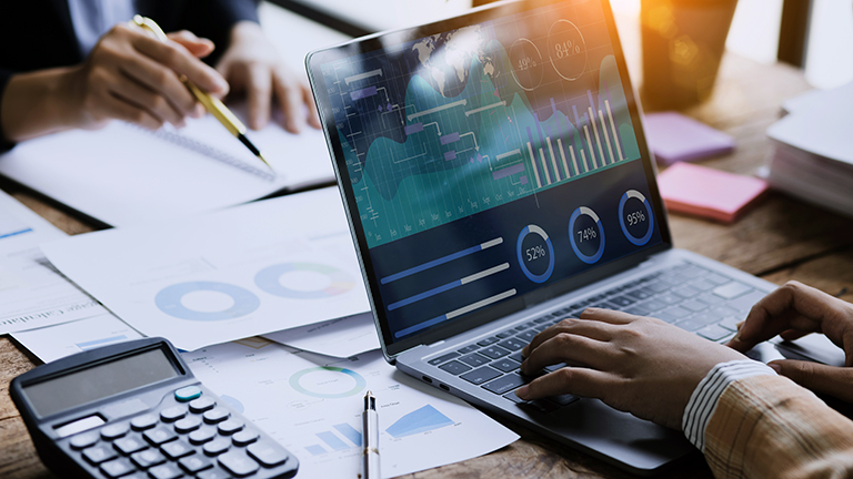 Technology and financial advisory services. Business teamwork and working on digital laptop computer with advisor showing plan of investment to clients at table office. 